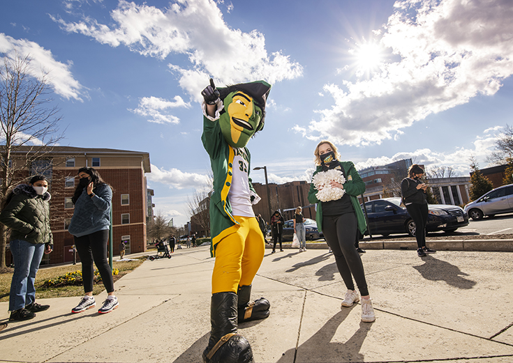 The Patriot and some of the Masonettes at the tip-off event