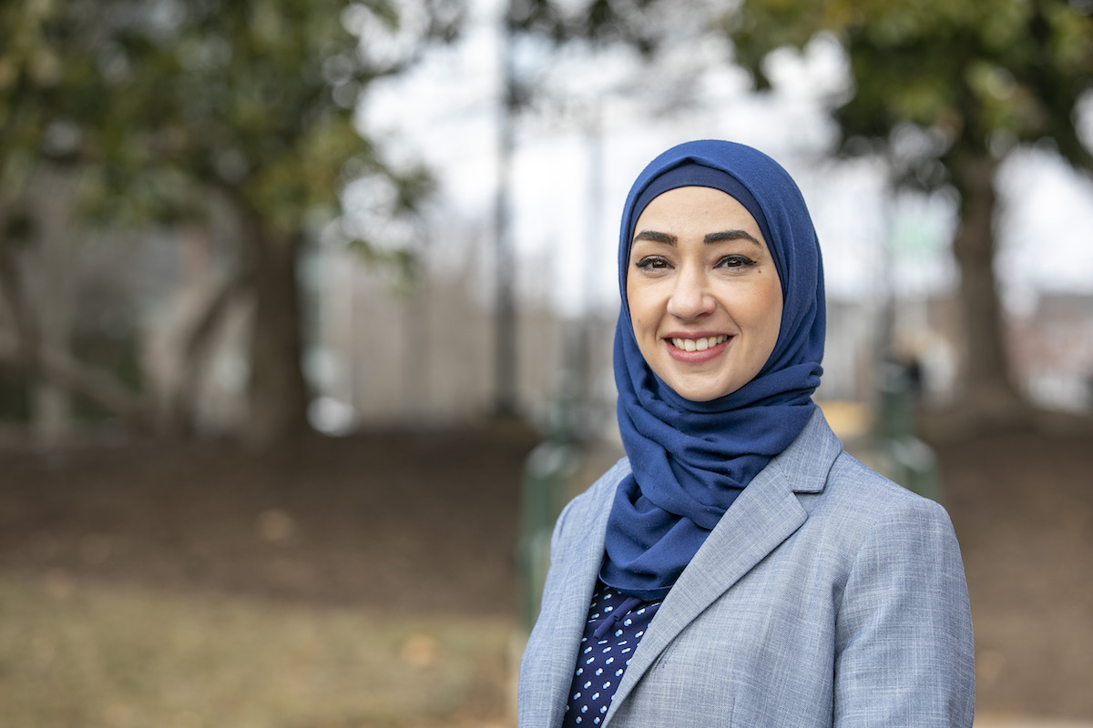 woman in a head scarf outside