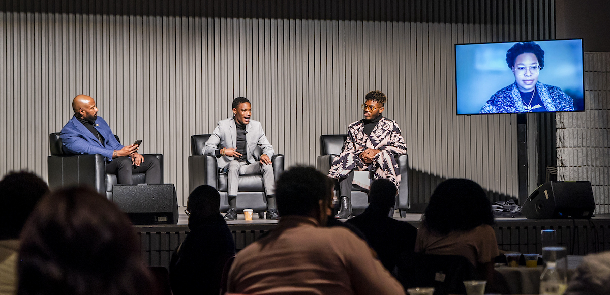 four panelists speaking