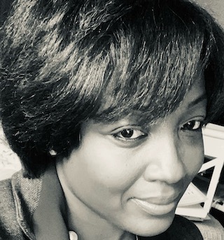 A black and white headshot of law student Shanessa Guidry.