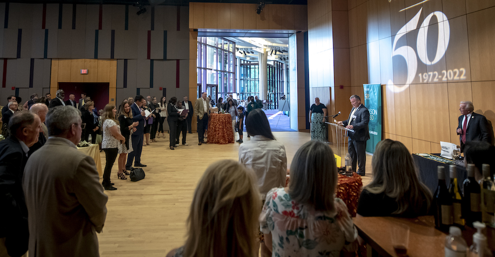 people at a reception in the Hylton Center