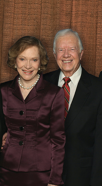 Jimmy and Rosalynn Carter pictured together smiling.