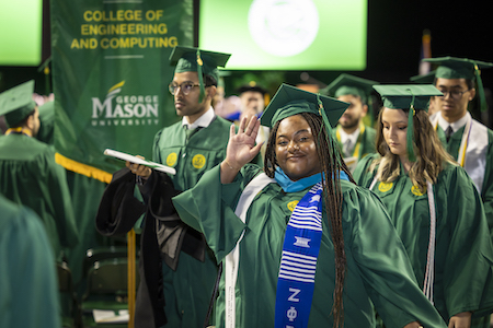 students processing at graduation