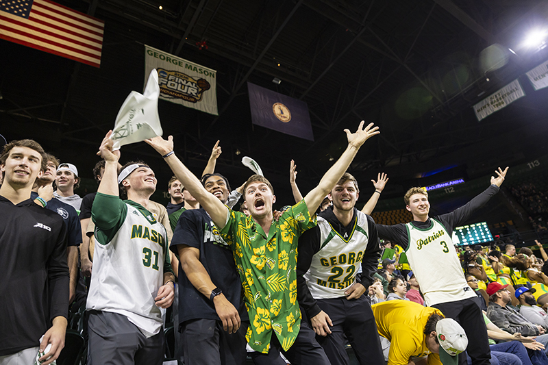 Mason Fans celebrate a basketball Homecoming victory