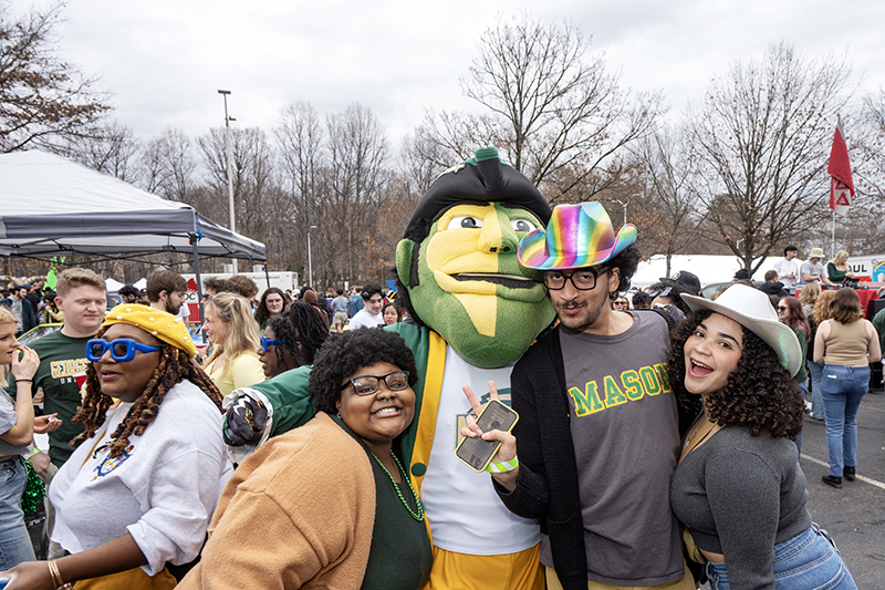 The Patriot takes selfies with tailgaters