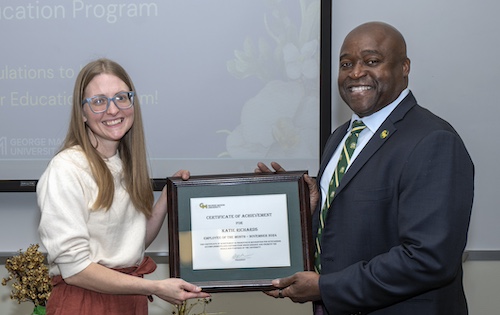 Katie Richards and George Mason President Gregory Washington during the November Employee of the Month ceremony