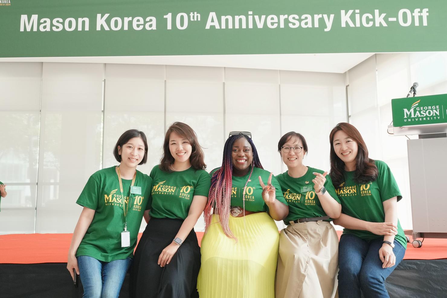 Attendees gather together for a photo at the Mason Korea celebration