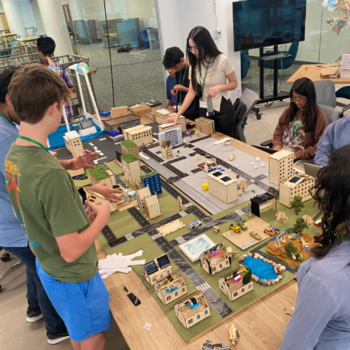 Students work on model town during the GMU Exploring Renewable Energy Engineering Summer Camp. Photo by PowerGMU.